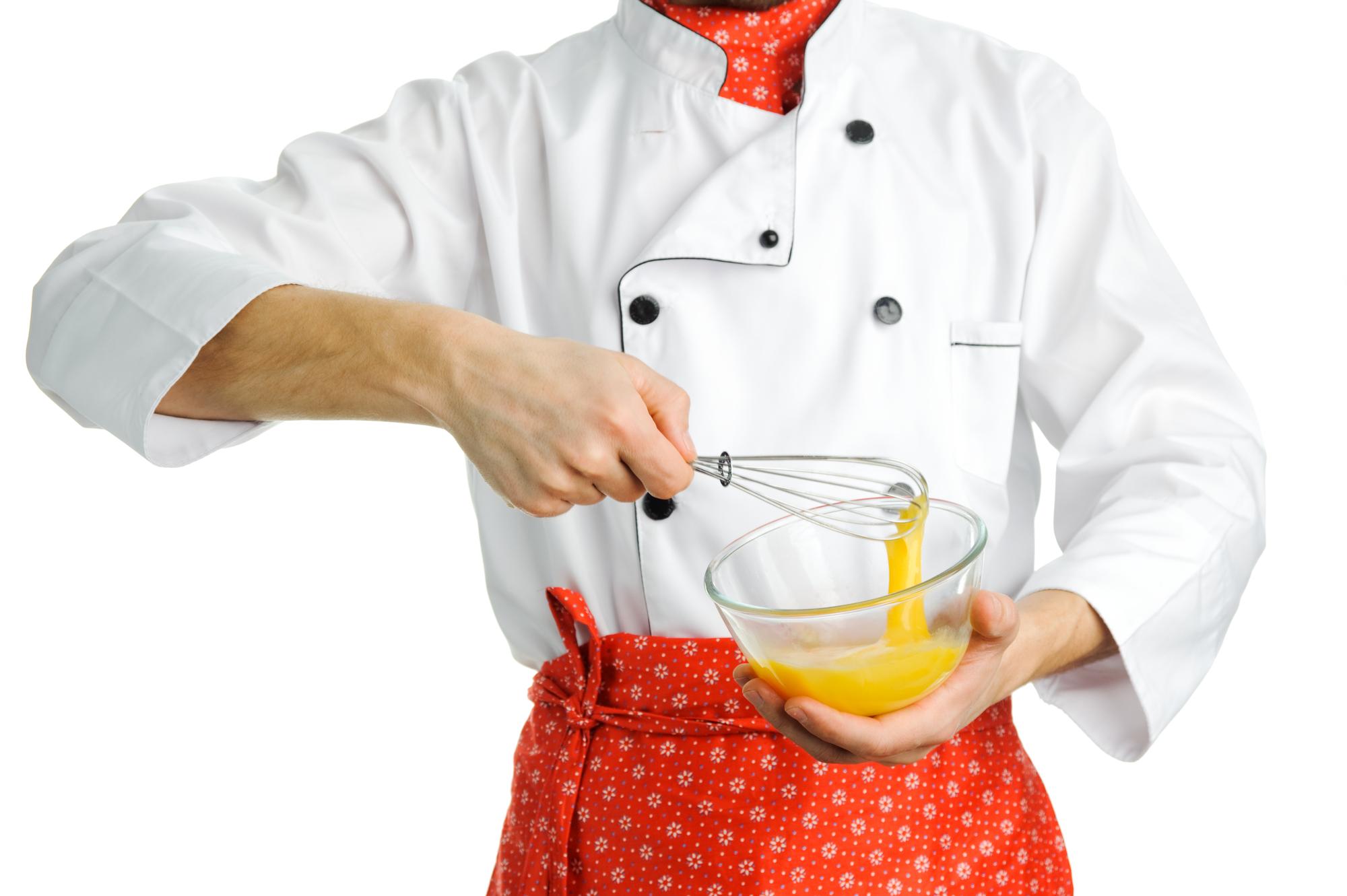 Chef demonstrating sauce technique