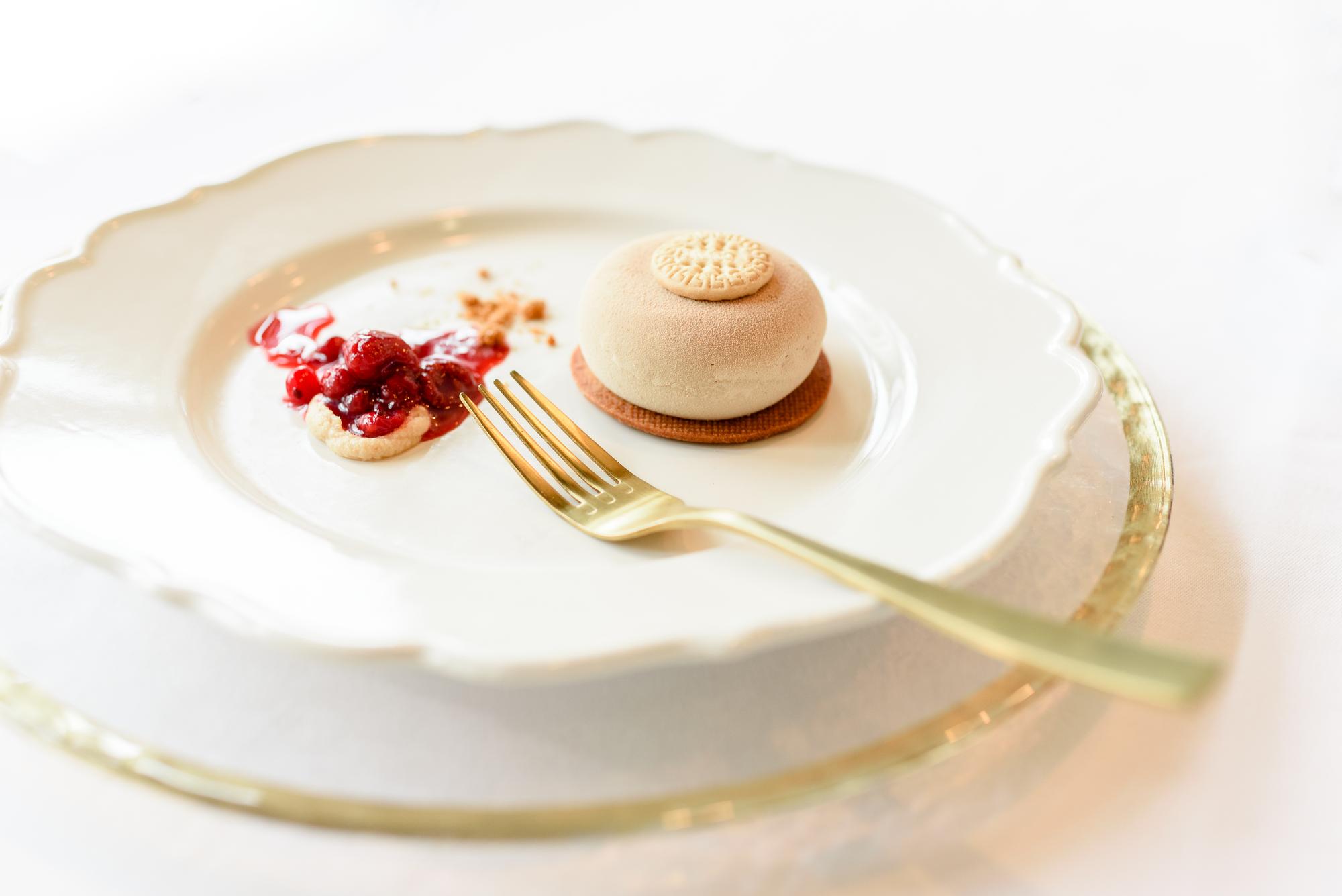 Close detail of plated dessert with gold leaf